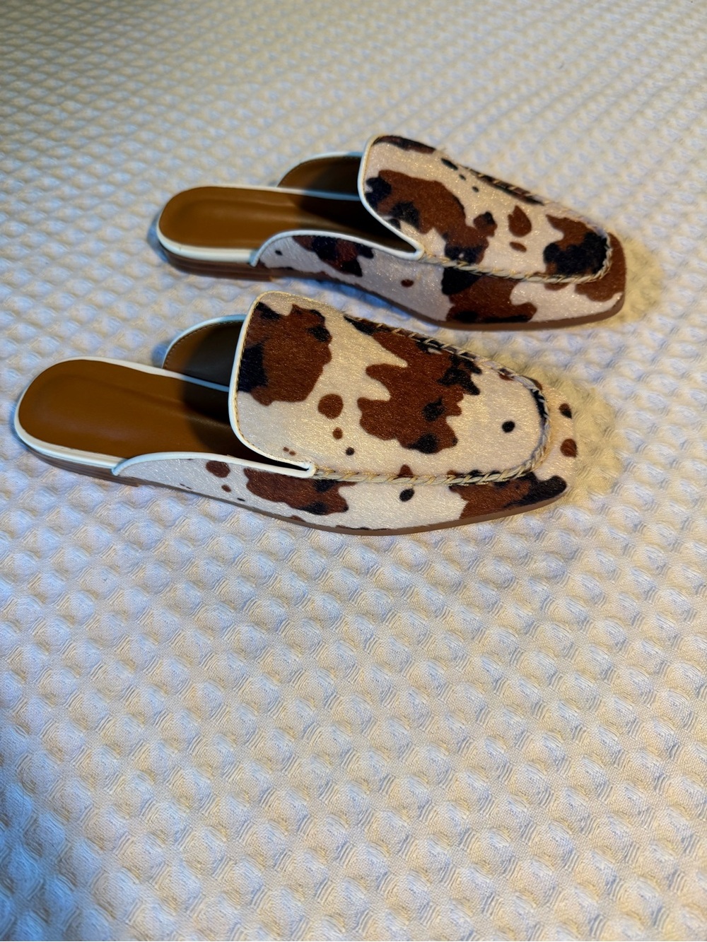 Cowhide-Print Slip-On Mules in Brown and White